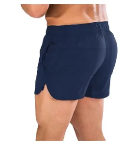 Rear view of men's navy blue quick-dry athletic shorts with ergonomic side slit