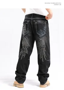Detailed back view of men's loose hip hop denim pants with intricate wing embroidery