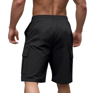 Back view detail of men's black cargo shorts with elastic waist and side pockets