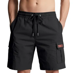 Detailed view of black cargo shorts for men showing the drawstring and pocket texture