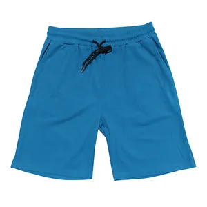 Detailed view of bright blue men's corduroy shorts with drawstring waist and pockets
