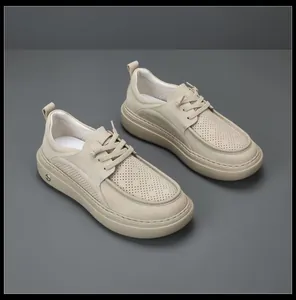 Comfortable men's beige leather loafers with unique moccasin-toe and perforated details