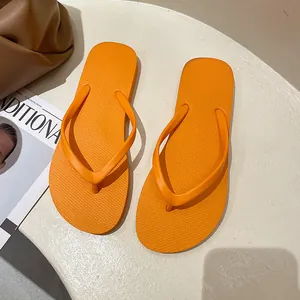 Bright orange non-slip thong sandals for women, perfect for summer beach and outdoor wear.