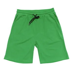 Flat lay view of men's vibrant green corduroy casual shorts with adjustable drawstring