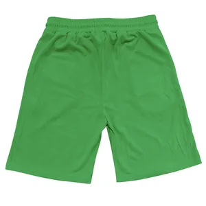 Detailed macro view of green corduroy casual shorts with elastic waistband and soft texture