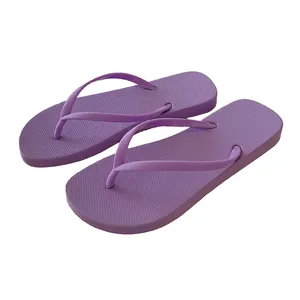 Classic purple flip-flops for women featuring anti-slip textured sole for beach
