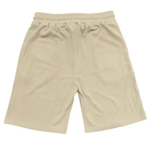 Detailed macro view showing the vertical corduroy fabric texture of these beige men's casual shorts