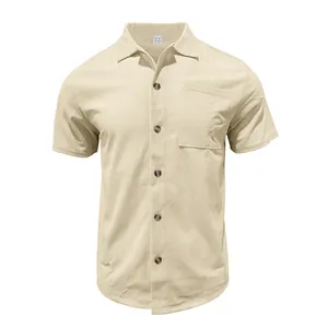 Detail of a men's beige corduroy short-sleeved casual shirt with buttons and pocket