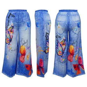 Detailed view of women's wide leg pants with colorful butterfly and floral prints.