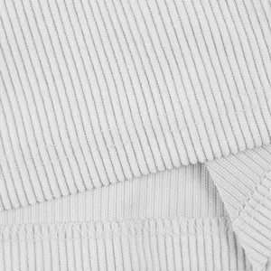 Close-up macro view of high-quality grey corduroy fabric texture and neat stitching details