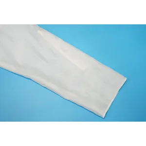 Close-up of white chiffon sleeve with roll-tab button detail for sun protection