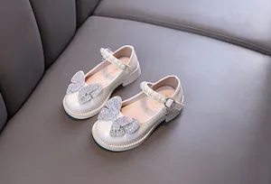 Elegant beige girls princess shoes with rhinestone butterfly and pearl strap details