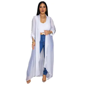 Full body view showing the elegant flow and sheer texture of the long white chiffon cardigan
