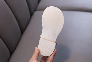 Detail view of anti-slip rubber sole for girl's princess flat shoes with size 26