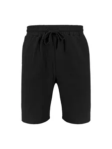 Detailed view of men's black linen casual shorts with adjustable drawstring waist