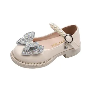 Beige Mary Jane princess shoes for girls with rhinestone butterfly and pearl strap