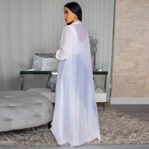 Elegant back view of the long white sheer chiffon cardigan with a flowing silhouette