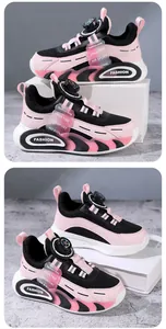 Zapatillas deportivas infantiles de malla transpirable rosa y negro con cierre giratorio top.