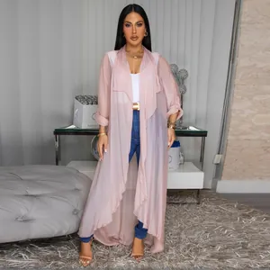 Detail of a pink sheer chiffon long cardigan featuring a draped front and loose fit