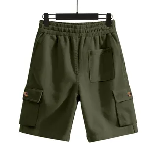 Close-up of olive green corduroy cargo shorts showing texture and pocket details.
