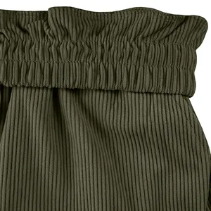 Detail shot of olive green corduroy shorts showing the elastic paperbag waistband.