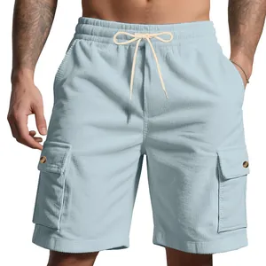 Close-up detail of men's light blue corduroy cargo shorts with drawstring waist