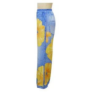 Detailed side view of casual wide-leg pants featuring sunflower print and denim texture
