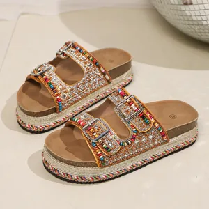 Close-up detail of Bohemian platform sandals featuring colorful beadwork and rhinestones
