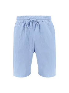 High-quality detail of men's light blue casual linen shorts with elastic drawstring waist