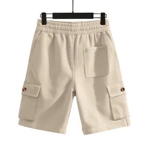 Detailed back view of men's loose corduroy cargo shorts in beige with utility pockets