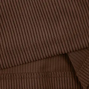 Close-up detail showing the texture and stitching of brown heavyweight corduroy cargo shorts
