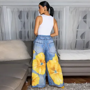 Back view of women's floral print wide leg trousers with large yellow flower details.