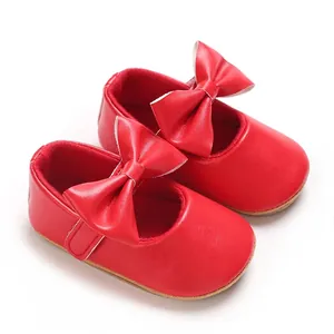 Classic red baby Mary Jane walking shoes with soft soles and large decorative bows