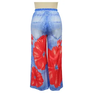 Back view of high-waist wide-leg trousers with faux denim and red flower print