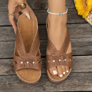 Stylish brown wedge sandals for women with hollow-out flower detail and platform sole