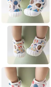 Close-up of breathable mesh baby walking shoes with colorful patterns and soft soles