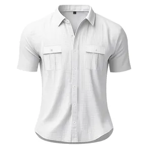 Detailed front view of white short-sleeve linen shirt with two buttoned chest pockets