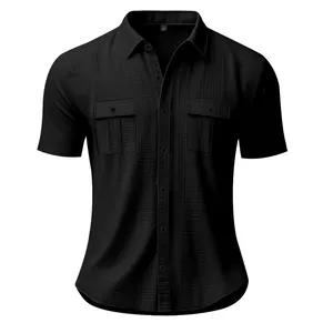 Front detail view of a black men's short-sleeve linen shirt featuring dual chest pockets.