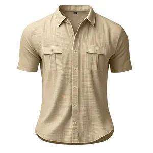 Front detail of men's short sleeve linen shirt in khaki with double chest pockets.