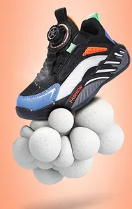 Detailed view of children's breathable mesh sneakers with an innovative rotating buckle lacing