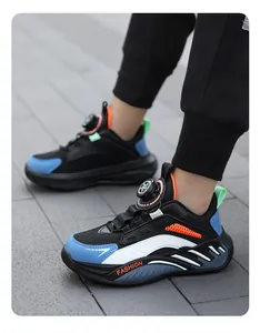 Detail view of boys' breathable mesh sneakers with convenient dial closure system