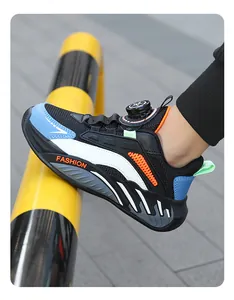 Close-up of boys' athletic shoes with breathable mesh and rotary buckle system