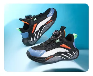 Detail view of boys' breathable mesh sneakers with a convenient rotary dial lacing system