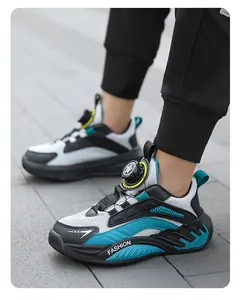 Close-up of boys mesh breathable sports shoes with rotary buckle detail