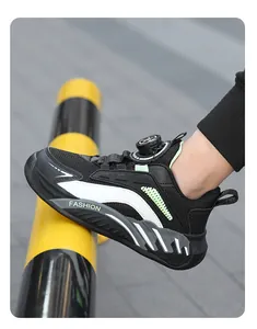 Close-up detail of boys' breathable mesh running shoe featuring easy rotary buckle closure