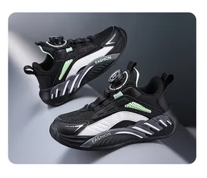 Detail view of boys' black mesh sports shoes with a convenient rotary dial lacing system.