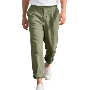 Detail view of men's olive green breathable linen casual trousers with drawstring waist