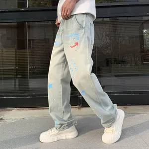 Men's retro light blue loose fit jeans featuring stylish urban graffiti and graphic prints