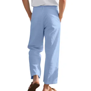 Back view of breathable men's loose linen casual straight-leg trousers in light blue