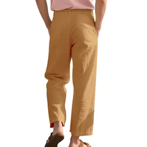 Detailed back view of breathable men's loose straight-leg linen trousers in tan
